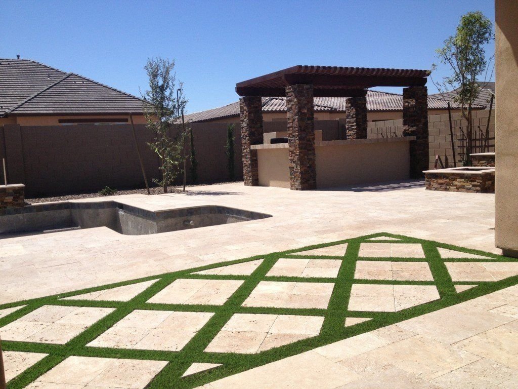 We've designed and installed this paved artificial turf driveway in Houston, TX.