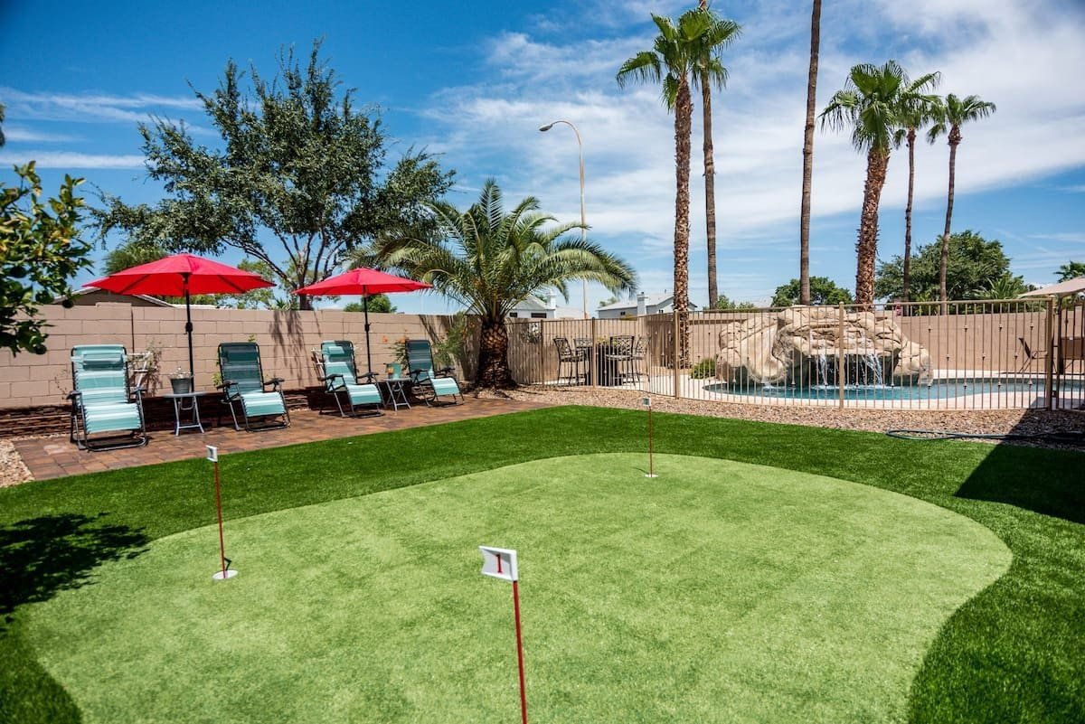 This golf putting green is a fantastic addition to a backyard in Houston, TX.